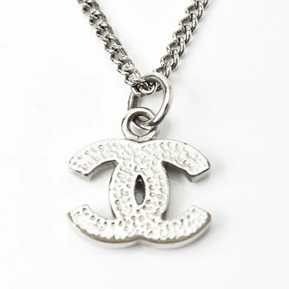 CHANEL Authentic White Logo Necklace